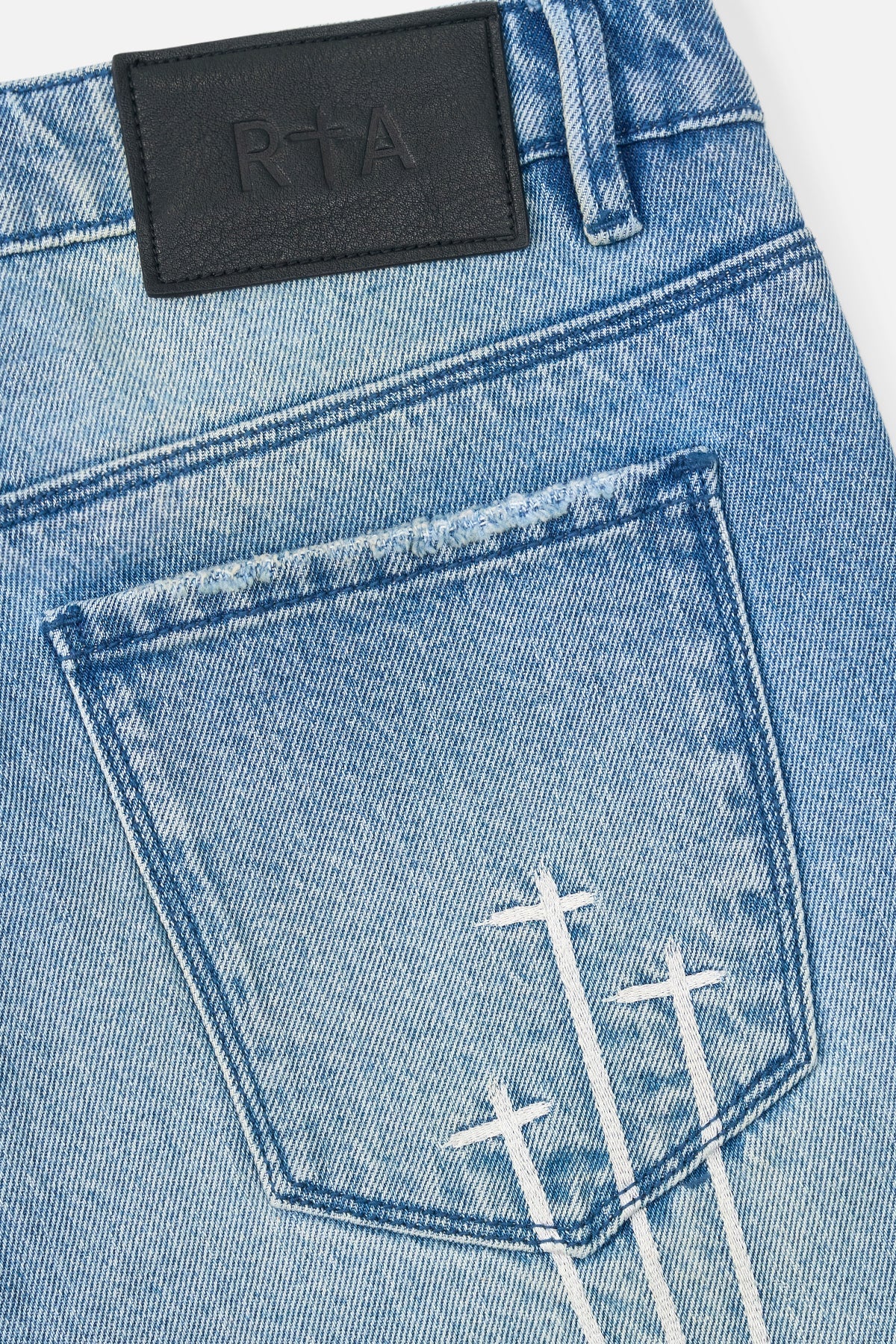 BRYANT RIPPED SKINNY JEAN | BLUE HAZE TRIPLE CROSS